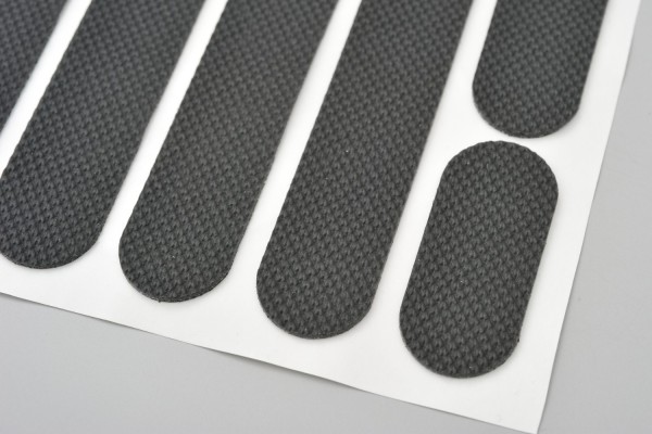 Anti-slip sticker "SLOT" for motorcycle seat