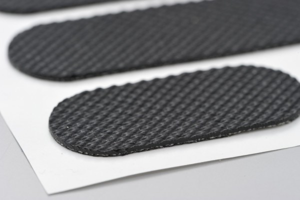 Anti-slip sticker "SLOT" for motorcycle seat