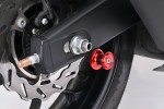Swing arm spool set CNC red anodized M6 with Nylon spacer